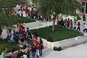 During eighth grade privilege, Spanish students break into a flash mob dance. Teachers, Christina Donnelly and Jose Echezarreta coordinated the Spanish flash mob.