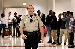 Shelby County Sherrif’s Department SRO Joseph Fox wears a personal body camera while on duty on Oct. 15, 2014, at Southwind High School in Memphis, Tenn. (Stan Carol/The Commercial Appeal/TNS)