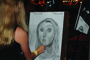 The Save the Arts Gala started with finger food and conversations, along with a showcase of live art. The drawings included painting, drawings, charcoals, and portraits.