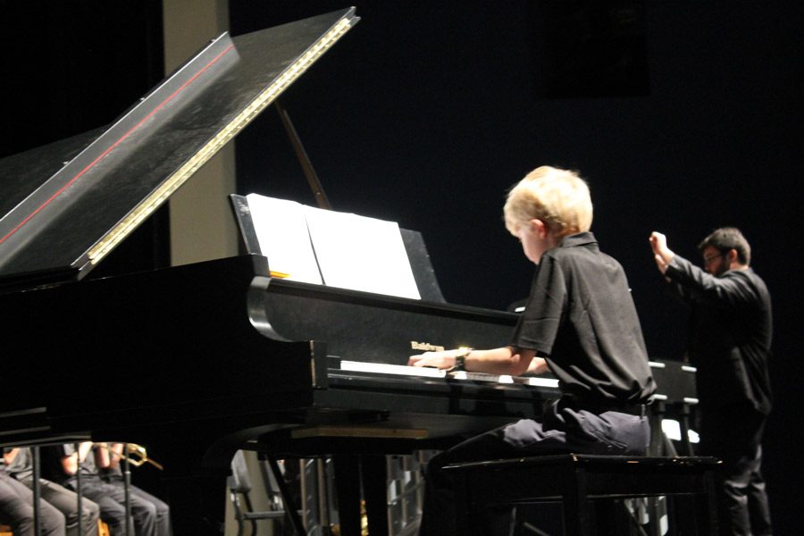Piano major Isaac Clark plays “Walrus Walk” for the beginning jazz band. The concert took place in the Mainstage Theater on Oct. 27.