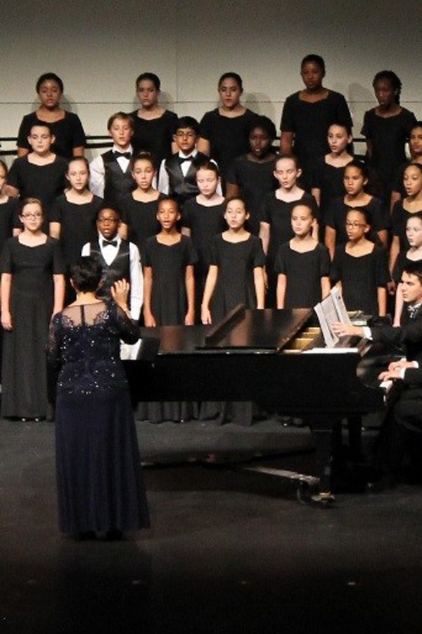 Vocal students from Girls’ Chorus sang “Astonishing” at their fall concert on Oct. 19. “If I had to choose my favorite part, it would probably be singing with girls’ chorus because I thought that the song ‘Astonishing’ sounded so beautiful when we sang it,” Zoe Dupont, eight grade vocal major said.