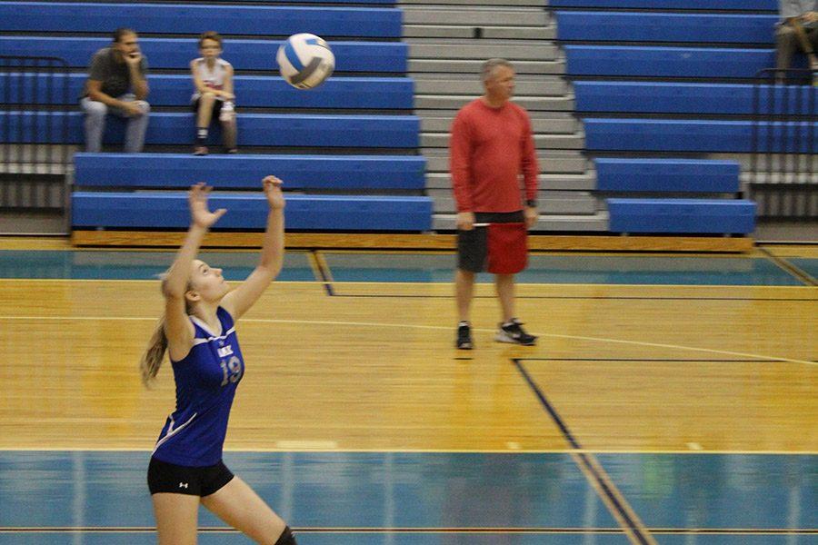 Julia Gonnello, eighth grade back row setter, sets the ball to the opponent, Independence Middle. Gonnello said, “Getting ready for a big game means a lot of playing time. We work on tweaking our hitting and spots, and tightening our defense depending on who were playing.”

