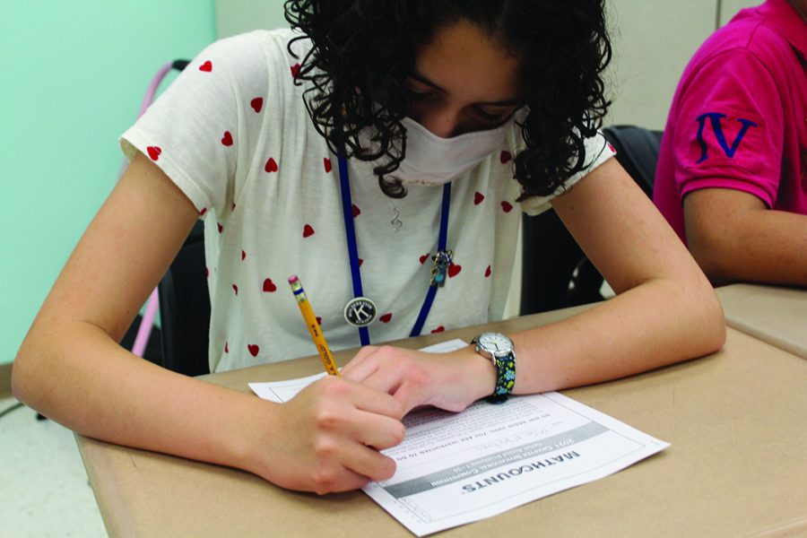 To prepare for upcoming competitions, MathCounts’ members practice by taking different tests.   “We either have a sprint round, which is 30 questions in 30 minutes, or we will have a target round which is where you have two questions with six to eight minutes to answer them,” Mia Martinez, seventh grade strings major and MathCounts member said.  