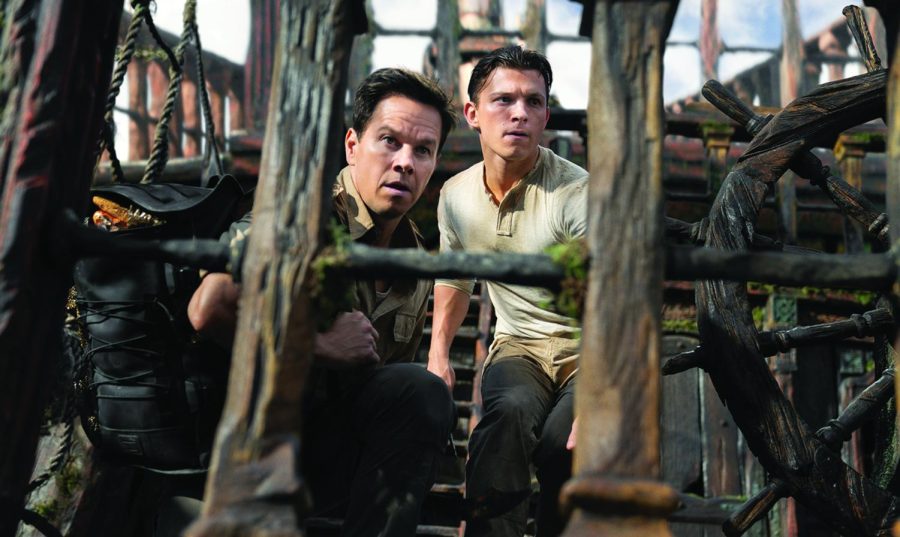 Mark Wahlberg as Sully, left, and Tom Holland as Nathan Drake in 
