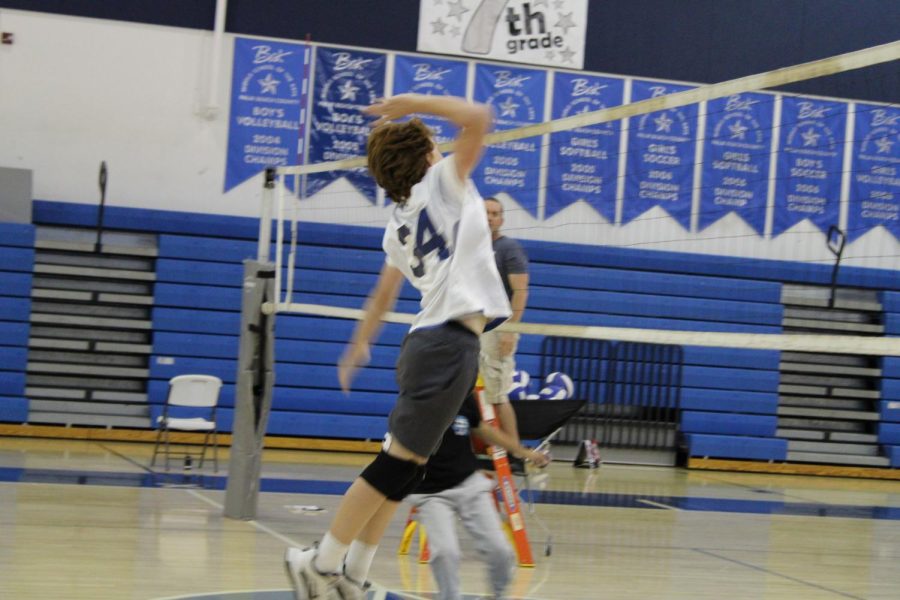 Spiking the ball, Gavin Chandler jumps to win the point. “We are a new team, and since most of our players are inexperienced, we are forming a bond that many teams have had for the past few years. It encourages us to work harder during practice,” Chandler said. 