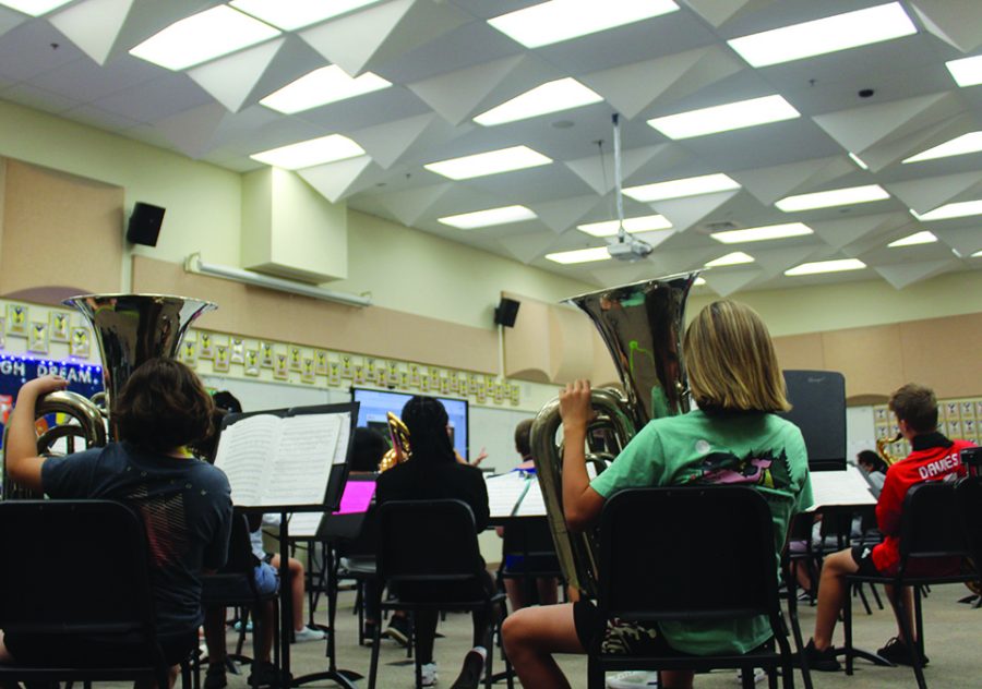 Jamie Groves refines her students’ skills for their upcoming fall concert. “I love seeing what the new students have learned,” Groves said. Photo by Christian Nemes
