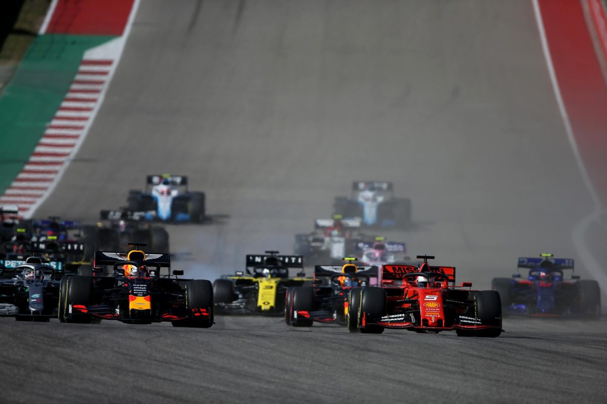 Max Verstappen of the Netherlands driving the (33) Aston Martin Red Bull Racing RB15 and Sebastian Vettel of Germany driving the (5) Scuderia Ferrari SF90 battle for position into Turn 1 at the start of the F1 Grand Prix of USA at Circuit of The Americas on November 3, 2019 in Austin, Texas. (Charles Coates/Getty Images/TNS)