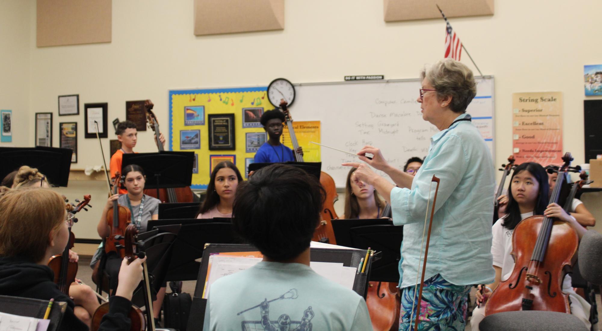 Music teacher Mrs. Bebee conducting her seventh and eighth-grade strings class. Photo taken by Leila Robins.