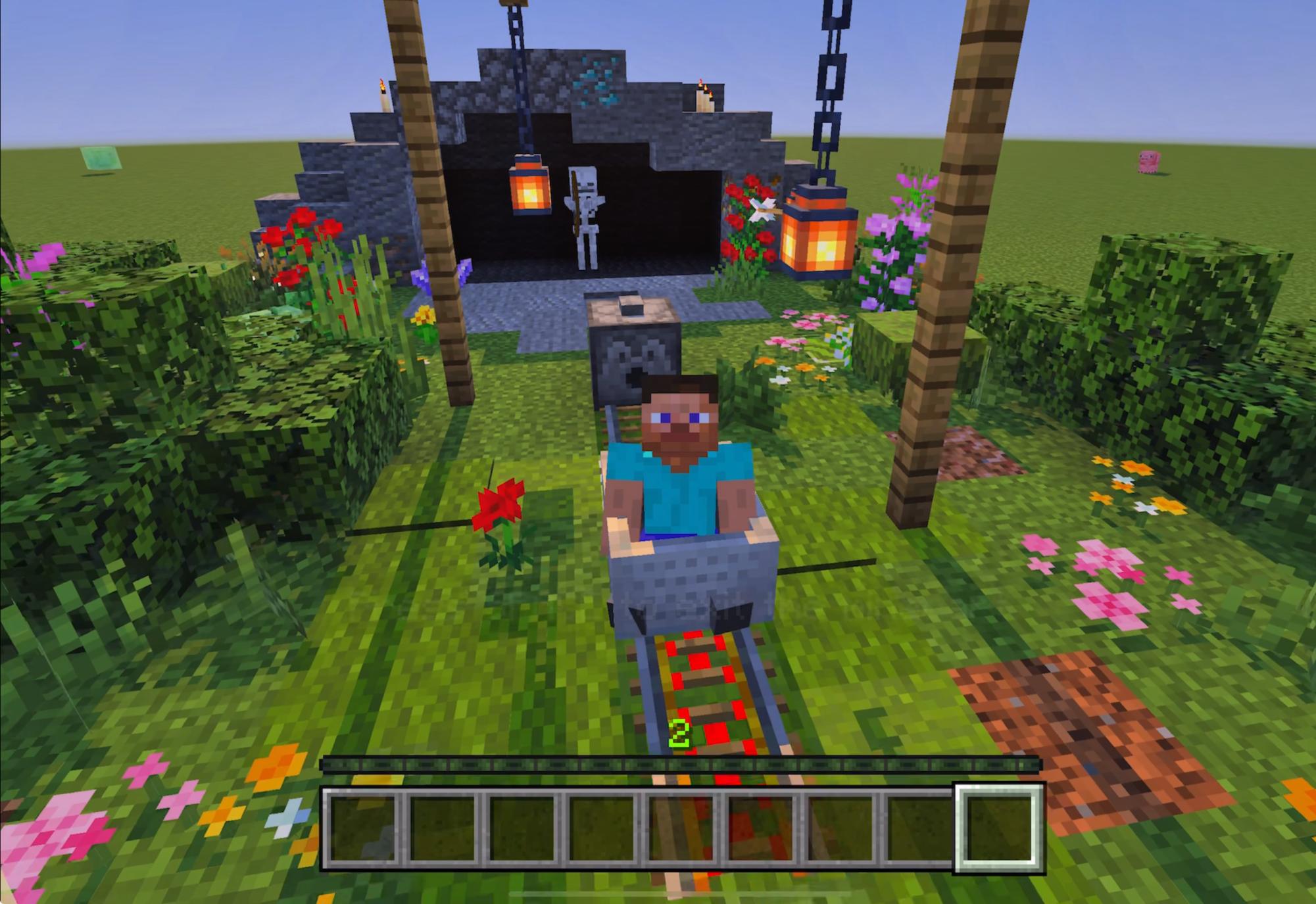 Steve sitting in a minecart